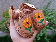 Beautiful Sunflower lace up baby and toddlers huarache sandalWe also have the lace up sunflower for adult you can create a mommy and baby matching outfit!!If you want to make sure they'll fit, please measure your baby foot from toe to heel.Use the following chart to choose the correct size.Size 5 walker  measure 12 cmSize 6 walker measure 13cmSize 7 walker measure 14cmSize 8 toddler measure 15cmSize 9  toddler measure 16cmSize 10 toddler measure 17cmSize 11  toddler measure 18cmSize 12  toddler Adjustable Casual Huaraches For Spring, Casual Adjustable Huaraches For Spring, Handmade Casual Huarache Sandals For Spring, Casual Handmade Huarache Sandals For Spring, Adjustable Huarache Sandals For Spring Festival, Spring Festival Adjustable Huarache Sandals, Handmade Casual Huaraches For Spring, Casual Handmade Huaraches For Spring, Adjustable Soft Sole Huarache Sandals For Spring