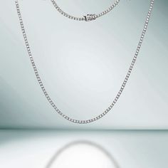 The Diamond Tennis Necklace is a stunning piece of jewelry that features a total of 8.05 carats of high-quality diamonds set in 14K gold. Each diamond is secured by a 4-prong setting, ensuring that they are held securely in place and allowing them to shine brilliantly. The diamonds are carefully selected for their exceptional quality, all our diamond are 100% natural. The necklace is designed with a delicate chain that sits elegantly around your neck, making it the perfect accessory for any occasion. Whether you're looking to add some sparkle to your everyday wear or to make a statement at a special event, this Diamond Tennis Necklace is sure to impress. It's a timeless piece that will be cherished for years to come. PRODUCT DETAILS: Metal Type: 14K Gold Gold Weight: 15.50 gr. Diamond Weig Beautiful Diamond Necklace, Diamond Tennis Necklace, 14k Yellow Gold Necklace, White Gold Necklaces, Tennis Necklace, Travel Jewelry, Natural Earth, Quality Diamonds, Diamond Sizes