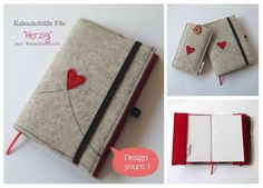 an open notebook with red hearts on it and the cover is made out of felt