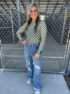 Sterling Kreek Pep Rally Green Mesh Top | Gussied Up Online Get ready to stand out at your next pep rally with this quirky and playful green and white checked mesh top! Featuring a unique design, this top will bring some fun and excitement to your game day outfit. Show off your team spirit in style with the Pep Rally Mesh Top. Find all the matching accessories here as well! There is a wild rag, a latigo, and a scrunchie too! 96% POLYESTER 4% SPANDEX SIZE CHEST LENGTH SLEEVE WIDTH SLEEVE LENGTH X Green Mesh Casual Top, Trendy Green Mesh Top For Spring, Trendy Green Long Sleeve Mesh Top, Casual Green Mesh Top, Casual Green Mesh Top For Spring, Trendy Grid Pattern Tops For Spring, Green Mesh Top, Checkered Top, Pep Rally