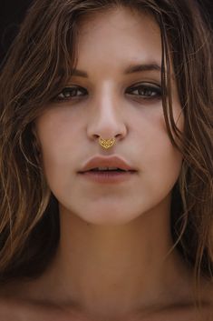 "Lotus 24K gold plated over Sterling Silver Septum Ring, Daith Earring, also fits Helix, Daith, Tragus, Cartilage Earring Jewelry, Tribal Unique Earring, available in 16g and 18g oooo Septum rings are super on-trend jewelry. Find a septum ring that works best for your personality. You could go subtle and rock a simple one, or you can go bold and wear one that's colorful! It is lightweight, comfortable and easy to wear, inspired by the lotus flower & antique filigree jewelry, this septum ring Wedding Yellow Gold Internally Threaded Nose Rings, Gold Spiritual Septum Ring Gift, Gold Hypoallergenic Nose Rings For Wedding, Gold Hypoallergenic Nose Rings For Anniversary, Gold Hypoallergenic Septum Ring For Anniversary, Unique Pierced Septum Ring As Gift, Nickel Free Yellow Gold Nose Rings For Gift, Nickel-free Yellow Gold Nose Ring As A Gift, Gold Septum Ring For Gifts