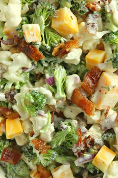 broccoli salad with cheese and bacon on it