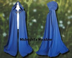 the cloak is blue and has white trim