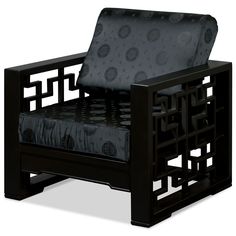 a black chair with an intricate design on the armrests and seat cushion is shown