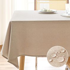 a table with a plate on top of it next to a cup and saucer