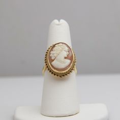 "For sale: (1) d696 Gorgeous 14k Yellow Gold Cameo Ring PLEASE READ ENTIRE DESCRIPTION BEFORE PURCHASING Pre-owned item. Good condition. Please see pictures for details. Sold as is, as seen on pictures. Specifics: 14k Yellow gold Size: 6.75 (U.S.) Width: 23.5 mm Total Weight: 6.7 grams Please be 100% sure of your purchase before buying, as we do not offer refunds. We are more than happy to provide any specific pictures, or answer any questions you have regarding our items. All jewelry is confirm Baby Gold Rings, Cameo Ring, Filigree Ring, Gold Diamond Rings, Saint Louis, Rings Statement, Gold Bands, Fashion Bracelets, Statement Rings