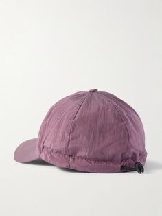 Stone Island's cap is made from the brand's Nylon Metal fabric, which is spun from regenerated ECONYL® fibres. Lined with breathable mesh, it's branded with the label's compass logo and has an adjustable toggle at the back. Nylon Baseball Cap For Travel, Lightweight Nylon Cap, Functional Nylon Travel Hat, Functional Nylon Hat For Travel, Sporty Nylon Travel Hat, Sporty Nylon Hat For Travel, Functional Nylon Baseball Cap, Nylon Six-panel Baseball Cap For Outdoor Activities, Nylon Baseball Cap For Outdoor