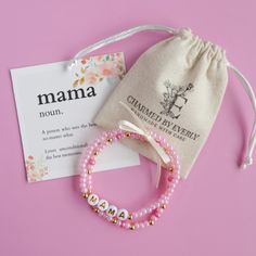 MAMA, pink beaded bracelet set! ONE Size. Set of TWO. Special gift, for special MAMA Made using 14K gold plated round beads and beautiful pink seed beads with 7mm letter letter beads. For perfect fit please measure wrist before purchasing. Made with an elastic transparent cord which might stretch slightly with wear. The knot closure is hidden and secured with glue. Bracelets should be rolled onto the wrist to avoid excess stretching. Due to the pattern this bracelet comes in ONE Size which is ME Pink Beaded Bracelet, Letter Bead Bracelets, Pink Beaded Bracelets, Mama Bracelet, Flower Girl Bracelets, Gift Sets For Women, Pink Beaded, Letter Beads, Stretchy Bracelets