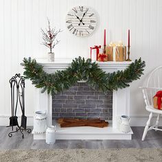 a fireplace decorated for christmas with presents and candles