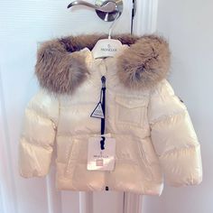 Ivory Pearl Infant White Coat With Detachable *** Genuine Fur** Trim Hoodie ( Genuine Fur Is No Longer Avail In Stores) Brand New With Tags ! Size 12/18 Months Jacket Bag And Hanger Included Luxury White Winter Outerwear, Luxury White Winter Puffer Jacket, Luxury White Puffer Jacket For Winter, Luxury White Long Sleeve Outerwear, Luxury White Long Sleeve Puffer Jacket, Coat With Fur Trim, Coat With Fur, Puffy Coat, Moncler Jacket