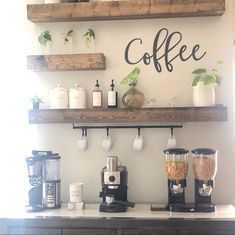 the coffee bar has two shelves with cups on them and one shelf above it that says coffee