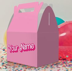 a pink box that says your name on it with confetti and balloons in the background