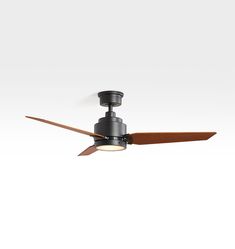 a ceiling fan with two wooden blades and a light on the top, against a white background