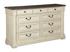 a large white dresser with drawers and wooden top