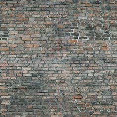 an old brick wall that has been painted red