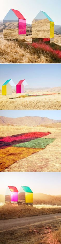 four different colored structures in the desert