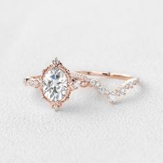 a rose gold engagement ring with diamond accents