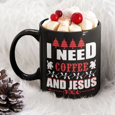 i need coffee and jesus mug with marshmallows in it next to pine cones