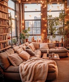 a living room filled with furniture and lots of windows