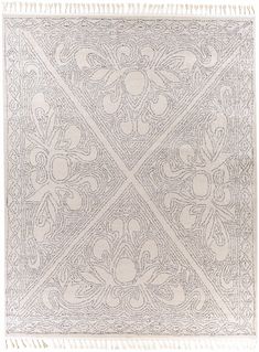 a white rug with an intricate design on it