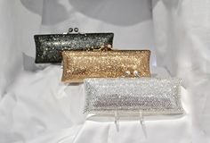 "Heart- stoppingly beautiful! These Rectangular Slim Baguette Shaped Formal Evening Purses in Stunning Colors will be the talk of town!! Each takes a month to make, crystal by crystal, all done by hand! Each one is a brand new evening bag fully covered in genuine, very fine, small sized Swarovski Crystals from Austria! This exquisite minaudiere bag is fully crystallized in all sides with meticulous precision and spectacular detail. It is also lined in genuine leather. You can carry it in the pal Minaudiere Bag, Everyday Purse, Wedding Purse, Practical Bag, Evening Purse, Emerald Engagement Ring, Evening Clutch Bag, Small Purse, Hollywood Glamour