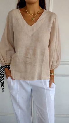 Beige V-neck Blouse With Relaxed Fit, Beige Cotton V-neck Blouse, Brown Cotton V-neck Blouse, Beige V-neck Blouse Solid Color, Beige V-neck Solid Color Blouse, Beige V-neck Solid Blouse, Cream Cotton V-neck Blouse, Brown Linen Tops For Vacation, Cream Linen V-neck Top