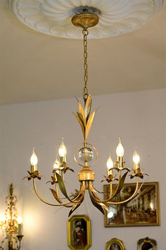 Revel in the glow of this Rodrick 6-Light Chandelier as it fills your home with vintage glamour. This chandelier creates a dramatic effect in any lavish space including a chic living room, luxurious master bathroom, or an opulent foyer. with its lustrous brass finish and durable construction, this chandelier offers a warm glow that will illuminate your home with style for years to come.