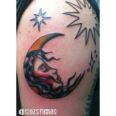 a woman's face with the moon and stars on her back shoulder tattoo design