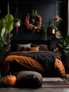 a bedroom with black walls and lots of plants