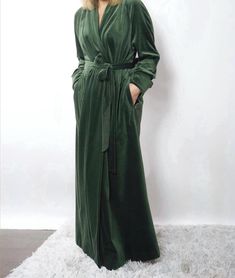 All my robes - https://www.etsy.com/shop/HBStyleEU Long velvet robe with 2 pockets, long sleeves, belt loops and belt. The fabric is wonderfully velvety and silky, soft and pleasant to the touch. - 100% Organic Cotton. - The model is wearing a dark green colored robe. SIZING SIZE S Bust: fits bust around 32"-36"/ 82-92 cm Hips: fits hips around 35"-39"/ 89-99 cm SIZE M Bust: fits bust around 35"-39"/ 89-99 cm Hips: fits hips around 38"-42"/ 97-107 cm SIZE L Bust: fits bust around 38"-42"/ 97-107 cm Hips: fits hips around 41"-45"/ 104-114 cm SIZE XL Bust: fits bust around 41''-45''/ 104-114 cm Hips: fits hips around 44''-48'' / 112-122 cm The width of the robe folded in half with a 6" (15cm) scent: XS - bust 39" (99cm), waist 38,5" (98cm), hips 42,5" (108cm) S - bust 40,5" (103cm), waist 40 Luxury Green Robe For Women, Green Long Sleeve Sleep Dress, Long Sleeve Green Robe For Fall, Green Cotton Loungewear Dress, Green Cotton Dress For Loungewear, Green Cotton Lounge Dress, Long Sleeve Cotton Robe For Hospital, Long Cotton Sleep Robe, Green Sleep Robe