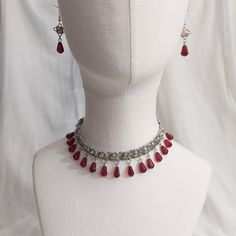 High quality handmade jewelry set  By eating a few pomegranate seeds, Persephone tied herself to Hades--the pomegranate being a symbol of the indissolubility of marriage. Inconsolable at the loss of her daughter, the corn goddess Demeter prevented the earth from bearing fruit unless she saw her daughter again Handmade Ruby Jewelry Sets, Elegant Handmade Ruby Jewelry Sets, Handmade Ruby Jewelry Sets In Elegant Style, Elegant Red Decorative Jewelry, Beaded Teardrop Wedding Jewelry, Bohemian Red Jewelry Sets For Celebrations, Handmade Teardrop Ruby Jewelry, Handmade Ruby Teardrop Jewelry, Handmade Ruby Jewelry For Celebrations