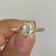 Vintage Style Engagement Ring 14K Solid Gold Wedding Ring Bezel Solitaire Ring For Women Art deco Split Shank Ring Unique Anniversary Gift The stones in jewelry are 100% hand-crafted it is cut and polished by our experienced craftsman. Moissanite is a diamond's best alternative. ✥ 𝐌𝐚𝐢𝐧 𝐒𝐭𝐨𝐧𝐞 𝐃𝐞𝐭𝐚𝐢𝐥𝐬 ↣ Shape: Cushion Cut. ↣ Weight: 2.98Ct APP  ↣ Dimension: 10*8MM ↣ Type: Moissanite ↣ Color: Colorless ↣ Clarity: VVS1 ↣ Making Process: Handmade - Crafted by our experienced team ✥ 𝐑𝐢𝐧𝐠 𝐃𝐞𝐭𝐚𝐢𝐥𝐬 ↣ Metal Purity: Solid Gold (14KT, 18KT); Silver (925 Sterling) ↣ Metal Tone: Yellow, White, Rose ↣ Stamp/Hallmark: Yes ↦ Jewelry Certificate: Free of Cost with Listed Design ↦ Guarantee High Quality ❁❁ 𝐉𝐞𝐰𝐞𝐥𝐫𝐲 𝐂𝐞𝐫𝐭𝐢𝐟𝐢𝐜𝐚𝐭𝐞 ❁❁ ↣ Jewelry By Memuna branded authent Engagement Rings Gold Not Diamond, No Prong Engagement Ring, Unique Oval Diamond Engagement Rings, Engagement Ring Traditional, Gold Engagement Ring Bezel, No Stone Engagement Ring, Moissanite Rings Engagement, Embezzled Engagement Ring, Timeless Gold Engagement Ring