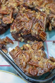 pecan brownies are sitting on a table