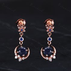 5mm Round Cut Blue Sandstone Dangle Earrings Rose Gold Sapphire Star Moon Drop Earrings Women Unique Dainty Promise Anniversary Gift for Her Side stones: sapphire and moissanite This ring can also be made in genuine solid 10k, 14k, 18k gold or Platinum, and all the rings in my shop can be customized too! If you want to know more details about the ring, just contact with me anytime! If you want to customize the ring, just contact with me anytime! If you want to make a custom jewelry, just contact with me anytime! PROCESS TIME AND SHIPPING It usually takes about 3-4 weeks to finish the ring and 4-6 days to deliver to you if you are in US. (Free Shipping within US!) We will offer you the tracking number once your ring is shipped. WARRANTY 30 days money back guarantee! If you have any question Elegant Blue Earrings With Moon Charm, Elegant Blue Moon Shaped Earrings, Moon Drop, Blue Sandstone, Earrings Rose Gold, Star Moon, Earrings Women, Anniversary Gift For Her, Rose Earrings