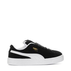 A fresh take on the classic Suede—this PUMA Suede XL youth sneaker is one for the books. Featuring an exaggerated padded collar tongue, a chunkier sole, and thick laces, this execution is inspired by the 00s but made for the modern day. A full suede upper plus a leather Formstrip makes this classic, durable, and ready for everyday looks.Features: Full suede upper with leather Formstrip. Exaggerated padded collar and tongue. Mesh insole with multiple screen-printed PUMA logo. Thick laces for a th Modern Lace-up Sneakers For Streetwear, Black Casual Platform Sneakers For Skateboarding, Modern Skate Shoes With Gum Sole For Streetwear, Classic Lace-up High-top Sneakers For Skateboarding, Urban Low-top Sneakers For Streetwear, Sporty Lace-up Platform Sneakers For Skateboarding, Low-top Platform Sneakers With White Sole For Streetwear, Urban Lace-up Platform Sneakers With Gum Sole, Urban Lace-up Platform Sneakers For Skateboarding