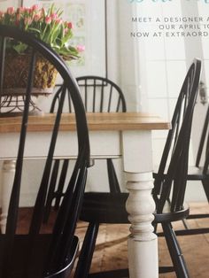 a magazine with chairs and a table in it