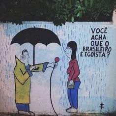 a painting on the side of a building depicts two people with an umbrella, one holding a microphone