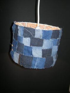 a lamp shade made out of old jeans