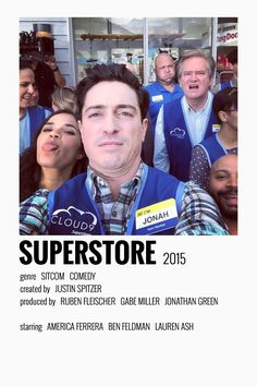 a poster with the words superstore in front of it and several people behind it