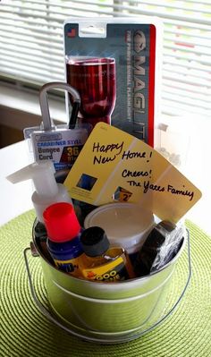 a bucket filled with items sitting on top of a table