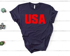 USA Shirt - Unisex T Shirt, Women Racerback Tank, Long Sleeve T-Shirt Tees Tshirt Sweatshirt Sweater Hoodie Gift For Men Women Boys Girls Well, let's say goodbye to all this boring apparel... The GodBlessThisDesign team creates custom clothes with great designs to suit all tastes. Our unique and blessed designs are a blast fit for every occasion and always a perfect fit... We combine our beautiful designs with high quality apparel like no one has ever done before. There's nothing worse than bein Freedom Shirts, Fourth Of July Shirts, Usa Shirt, Usa Flag, Family Shirts, Long Sweatshirt, Custom Clothes, Sweater Hoodie, Long Sleeve Tshirt