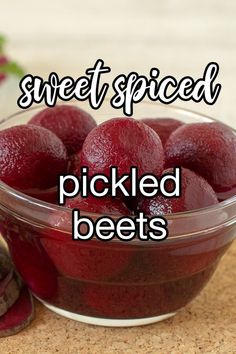 a bowl filled with pickled beets on top of a table