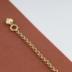 "\"14k Gold Rolo Link Bracelet with Heart Charm | Thick Belcher Chain Gold Bracelet, Sailor Lock Clasp, Puffy Heart Charm | Gift for Her\" ◖ P R O P E R T I E S ◗ * Material: 14k Gold * Weight #1: 2,8gram (for 7\", with charm, ±5%) * Weight #2: 5,9gram (for 7\", with charm, ±5%) Contact me if you are unsure about length. Photos belong to the #2 Large Rolo Bracelet ◖ D I O N J E W E L ◗ ‣ 14K REAL GOLD ‣ EXPRESS DELIVERY IN 1-3 DAYS* ‣ HANDMADE ONLY FOR YOU, NO USED JEWELRY ‣ GIFT BOX AND OTHER G Classic Heart Chain Bracelet For Valentine's Day, Classic Heart-shaped Chain Bracelet For Valentine's Day, Gift Heart Bracelet In Yellow Gold With Lobster Clasp, Yellow Gold Bracelets With Heart Charm, Yellow Gold Heart Bracelet With Lobster Clasp, Yellow Gold Heart Bracelet Gift, Classic Yellow Gold Heart Charm Bracelet, Yellow Gold Bracelet With Heart Charm, Yellow Gold Heart-shaped Jubilee Bracelet