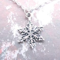 Item details: This beautiful sterling silver snow flake is hung from a solid sterling silver chain. Snowflake is 1/2 inch wide & 3/4 inch tall. You can pick from one snowflake or three snowflakes to hang on the necklace. Perfect for wearing anytime. About this necklace: *Solid Sterling Silver chain and components *Sterling silver snow flakes *Comes beautifully packaged & ready for gift giving Shipping: All items purchased from the shop are sent out with priority shipping! I will get item Sterling Silver Snowflake Jewelry For Winter, Sterling Silver Jewelry For Winter Gifts, Sterling Silver Necklaces For Winter Gifts, Silver Jewelry As Winter Gift, Silver Jewelry For Winter Gift, Sterling Silver Snowflake Jewelry, Silver Snowflake Necklace For Holiday, Silver Snowflake Necklace For Gift, Silver Snowflake Jewelry For Holidays