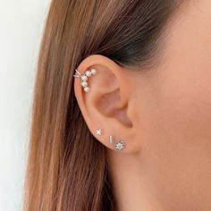 "Pearl Ear Cuff no piercing, Helix Earring, Cartilage earring, Fake piercing, Silver Ear Cuff, Pearl Earrings, Ear climber earrings This Dainty Pearl Ear Cuff is a cartilage earring that you can wear on your conch and helix. They are a good gift option. 👉🏼Details: ♥ No piercing needed. ♥ Material: High-Quality Solid 925 Sterling Silver. ♥ Finish: Silver and Gold plated Silver. ♥ Hypoallergenic, suitable for sensitive ears. ♥ Nickel-free and lead-free. 📏 Measurement: 13mm // 0.51\" 🎁 Packagin Trendy White Ear Cuff, Trendy White Single Ear Cuff, Minimalist White Single Ear Cuff, Elegant Tiny Silver Ear Cuff, Fake Helix Piercing, Zodiac Constellation Necklace, Faux Piercing, Helix Ear, Star Constellation