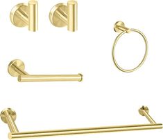 gold bathroom accessories set with towel bar, toilet paper holder and towel ring on white background