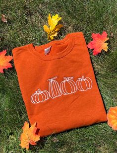 Get ready for fall with this cute embroidered sweatshirt! All sweatshirts are handmade and can be customized to your liking!  The sweatshirt is available in the color burnt orange but can be made on other colors by request.  The sweatshirt is 50% cotton 50% polyester. The sweatshirt sizing does run small so if you are looking for a oversized/comfy fit please size up! Long Sleeve T-shirt With Embroidered Logo For Fall, Fall Cotton Sweatshirt With Embroidered Graphics, Cotton Sweatshirt With Embroidered Graphics For Fall, Orange Long Sleeve Cotton Sweater, Custom Embroidery Long Sleeve T-shirt For Fall, Orange Crew Neck Sweatshirt For Fall, Fall Cotton Orange Sweater, Fall Crew Sweatshirt With Custom Embroidery, Fall Crew Neck Sweater With Custom Embroidery