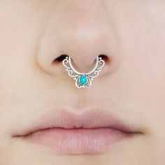 Unique and beautiful septum ring for pierced nose. Tribal, ethnic, delicate design. Can be worn as an earring for the tragus or earlobes as well. Material: Brass, Turquoise. *Also available in gold plated brass and Sterling silver ( Use scroll bar to choose your material) Inner diameter: 0.35 Inch - 8.5 mm Thickness: 1 mm - 18 gauge Measures: W- 0.59 Inch - 15 mm / L - 0.7 Inch - (18 mm) *Nickel- free Taking care of your septum ring: > How to use a septum ring- In order of taking care of your Faux Septum Ring, Pierced Nose, Scroll Bar, Faux Septum, Septum Hoop, Gold Nose Rings, Tiny Hoop Earrings, Septum Jewelry, How To Clean Metal