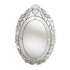 Inspired by the renowned Venetian glass mirrors, the Livia silver accent mirror adds old-world Italian charm to any space. The Livia silver accent mirror features a central mirror with beveled edges framed by an intricate floral pattern. An ornate outer frame showcases individually handcrafted pieces of embellished mirror, displaying extraordinary attention to detail. Place this stunning piece in the entryway to impress guests or in the bedroom to add an element of luxury. The Livia silver accent mirror will arrive fully assembled. Features: Classic and traditional accent wall mirror Color: Silver Constructed from MDF wood and mirror Silver finish Floral design Wall mountable Arrives fully assembled Dimensions & Weight: Dimensions: 30" High x 20" Wide x 0.79" DeepWeight: 9.92 lbs. Free shi Venetian Glass Mirror, Accent Wall Mirror, Crushed Diamonds, Classic Mirror, Silver Wall Mirror, Glass Mirrors, Oval Wall Mirror, Baxton Studio, Venetian Mirrors