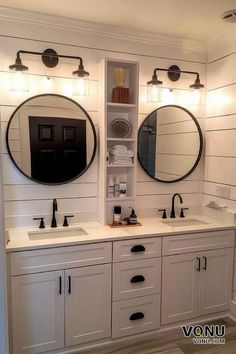 A farmhouse bathroom featuring dual sinks, round mirrors, shiplap walls, black fixtures, and ample storage, creating a cozy and functional space. Shiplap Farmhouse Bathroom, Modern Farmhouse Master Bath Mirrors, Rustic Farmhouse Master Bath, Farmhouse Bathroom Sink Ideas, Modern Farm Bathroom, Shiplap Wall Bathroom, Ideas Under Staircase, Shiplap Bathroom Ideas, Under Stairs Bathroom